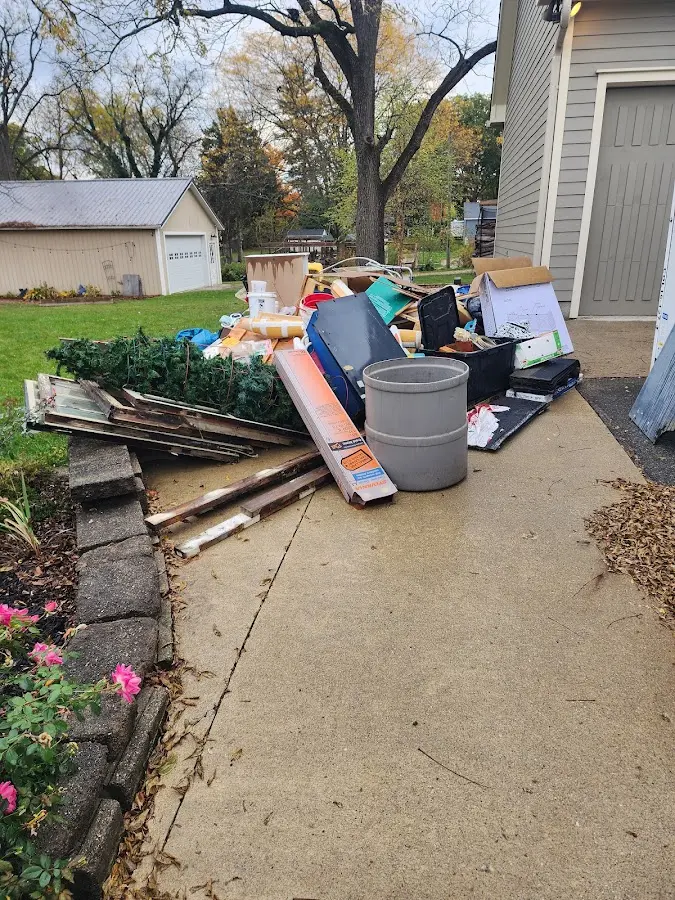 Dumpster being loaded with debris for 30 Yard Dumpster Rental in Upper Gwynedd